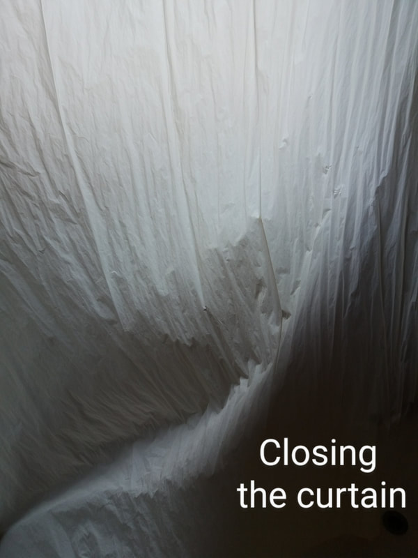 wavy drapery with poetic message: closing the curtain