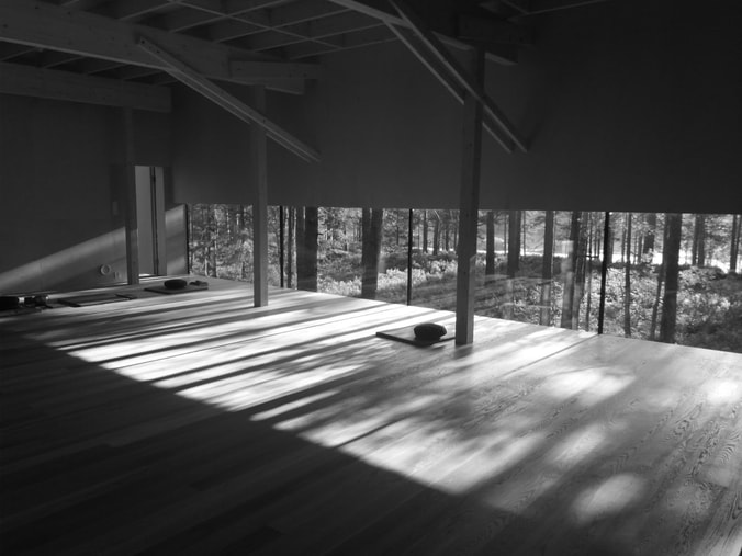 black and white photograph of the meditation hall at Skiptvet Buddhist Monastery